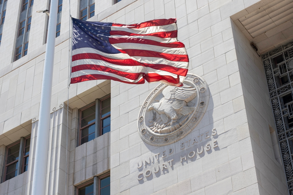 California Criminal Justice System represented by flag and courthouse