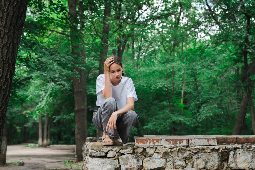 upset teen girl - Sexual Abuse at a Youth Residential Treatment Facility Lawsuit